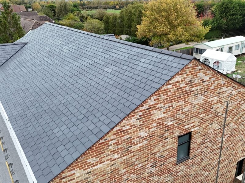 Clay tile roof by AM Roofing Services